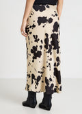Pantalón largo con estampado animal y corte acampanado